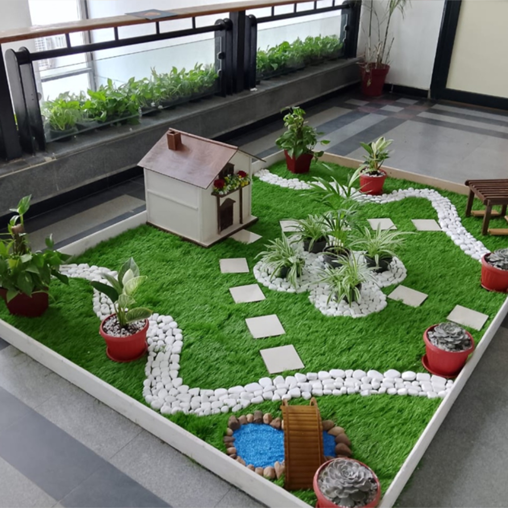 حديقة مصغّرة من مواد معاد تدويرها… إبداع بيئي بأيدي الأطفال